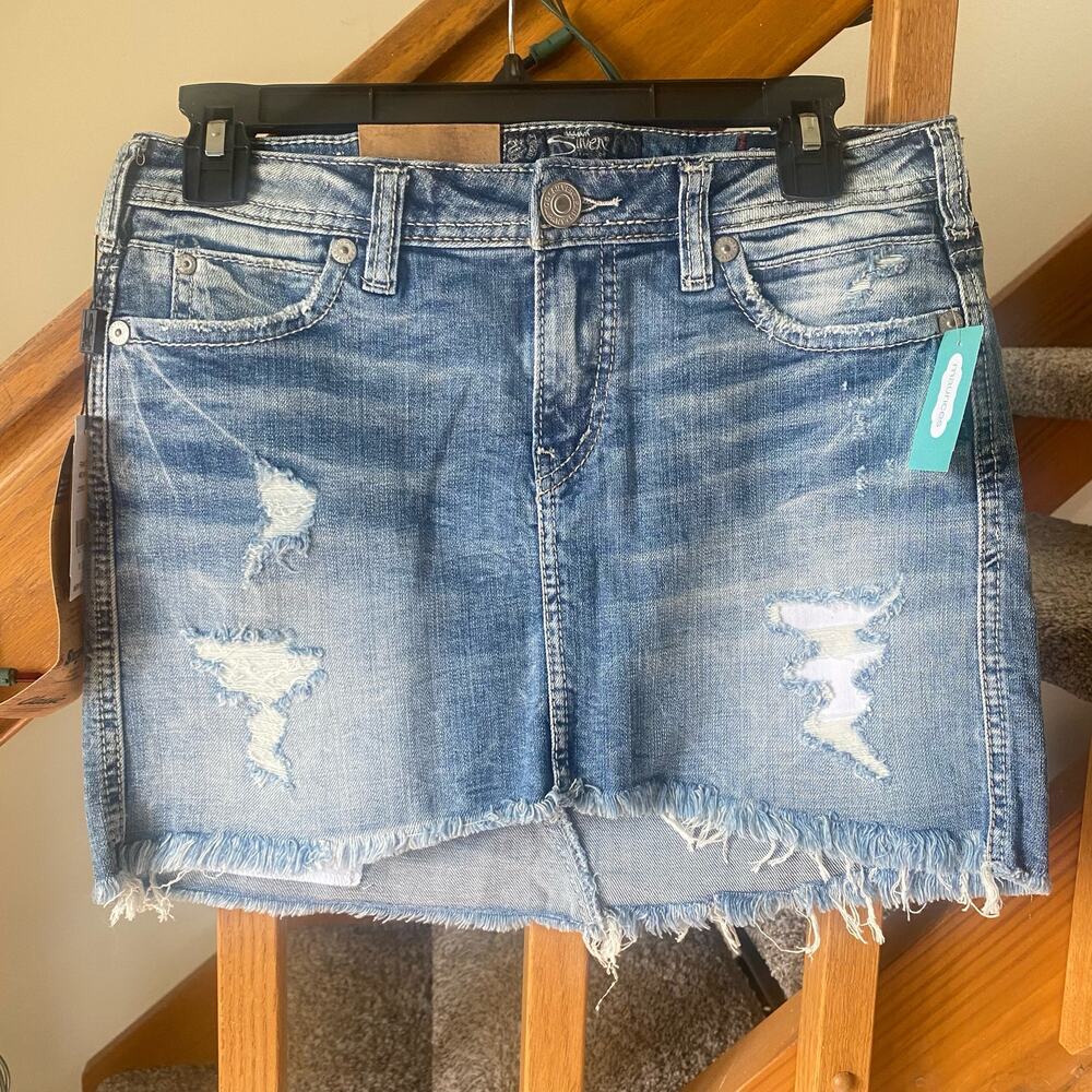 Silver distressed blue jean cut off mini skirt